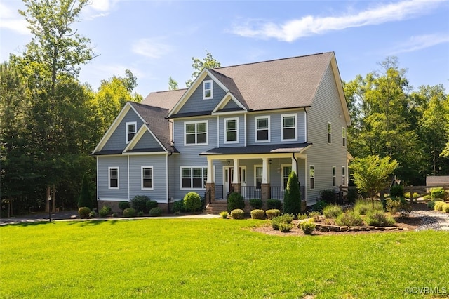9377 Magnolia Blossom Rd, Ashland, VA 23005 - craftsman-style home featuring a porch and a front yard