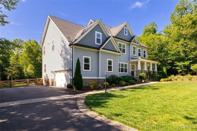 9377 Magnolia Blossom Rd, Ashland, VA 23005 - craftsman-style house with driveway, a porch, and an attached garage