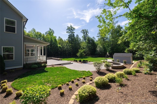 9377 Magnolia Blossom Rd, Ashland, VA 23005 - view of green lawn with a patio, a shed, and ceiling fan