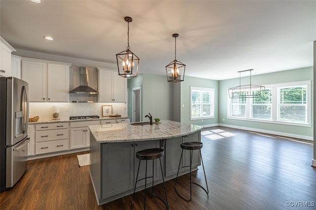 9377 Magnolia Blossom Rd, Ashland, VA 23005 - kitchen featuring wall chimney exhaust hood, stainless steel fridge with ice dispenser, dark wood-type flooring, white cabinets, and recessed lighting