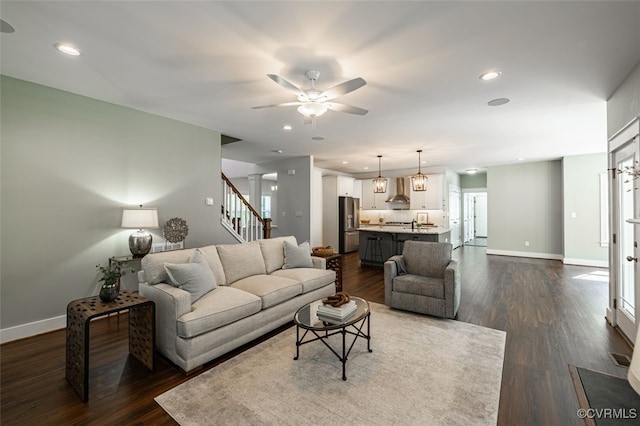 9377 Magnolia Blossom Rd, Ashland, VA 23005 - living room featuring a ceiling fan, stairway, dark wood finished floors, and recessed lighting