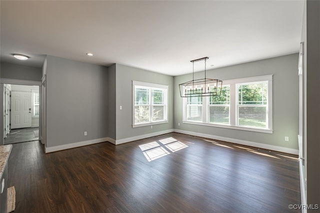 9377 Magnolia Blossom Rd, Ashland, VA 23005 - empty room featuring dark wood finished floors, recessed lighting, and a chandelier