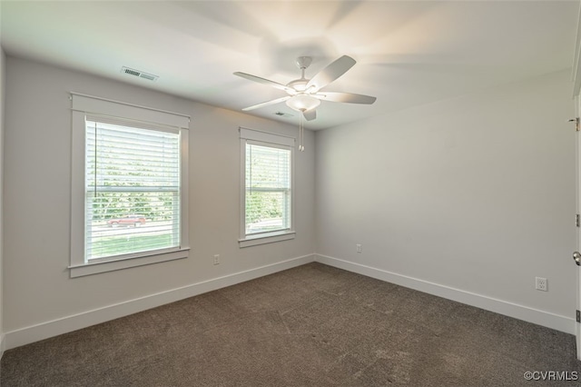 9377 Magnolia Blossom Rd, Ashland, VA 23005 - spare room with a ceiling fan and dark colored carpet