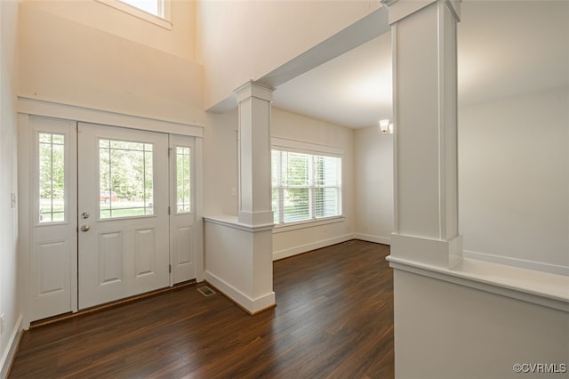 9377 Magnolia Blossom Rd, Ashland, VA 23005 - foyer entrance featuring decorative columns and dark wood-type flooring
