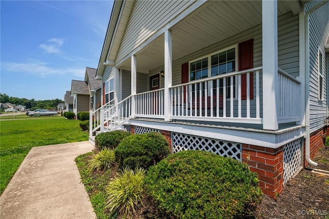 9949 Reymet Ct, North Chesterfield, VA 23237 - view of side of property with a porch and a lawn