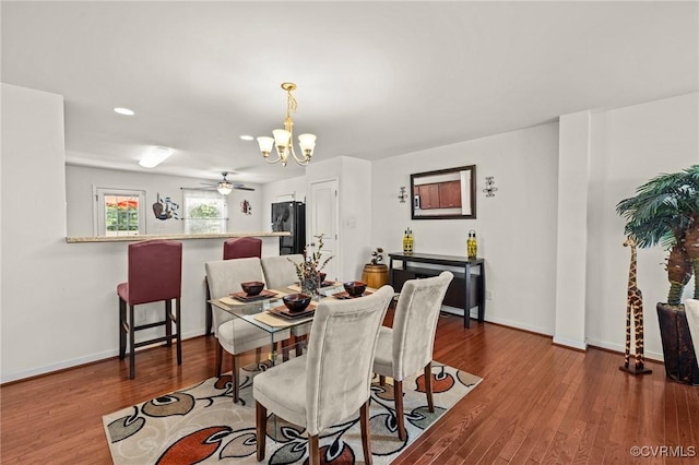9949 Reymet Ct, North Chesterfield, VA 23237 - dining space with a chandelier, wood finished floors, recessed lighting, and ceiling fan
