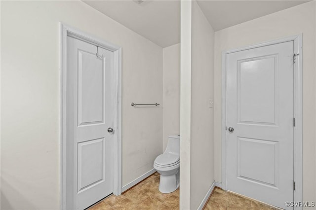9949 Reymet Ct, North Chesterfield, VA 23237 - bathroom featuring toilet and baseboards