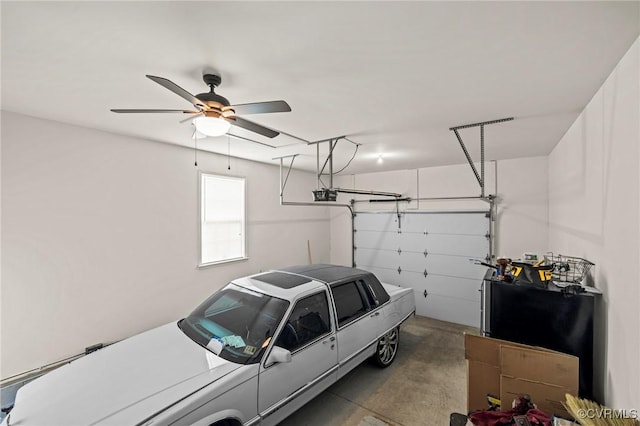 9949 Reymet Ct, North Chesterfield, VA 23237 - garage featuring a garage door opener and a ceiling fan