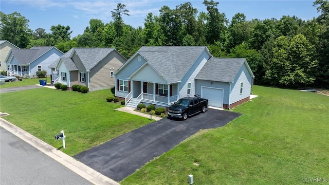 9949 Reymet Ct, North Chesterfield, VA 23237 - view of front of property featuring a porch, a garage, asphalt driveway, a shingled roof, and a front yard