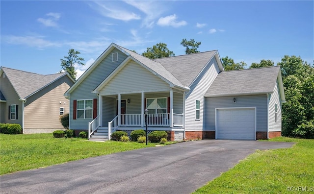 9949 Reymet Ct, North Chesterfield, VA 23237 - view of front facade with a porch, a garage, driveway, a front yard, and roof with shingles