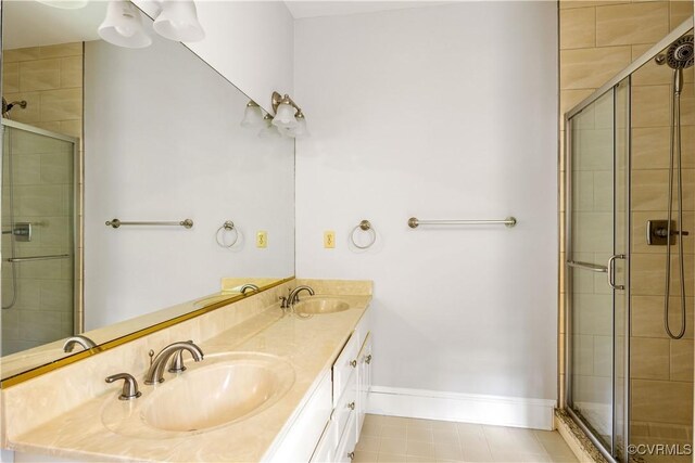 13905 Durhamshire Ln, Midlothian, VA 23113 - bathroom with a shower stall, double vanity, and tile patterned flooring