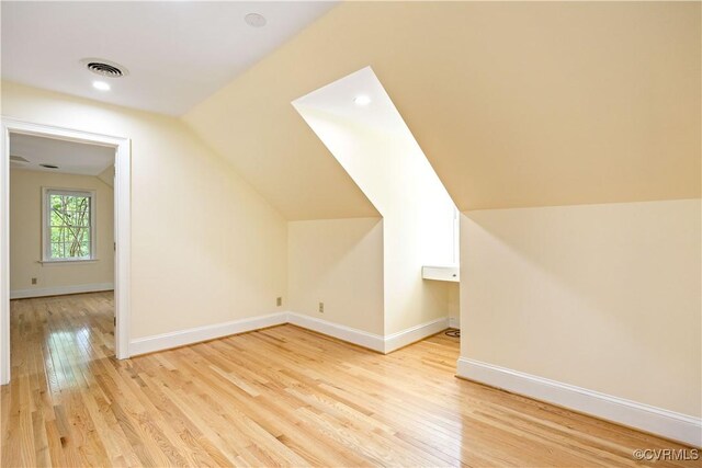 13905 Durhamshire Ln, Midlothian, VA 23113 - additional living space featuring light wood-type flooring and vaulted ceiling