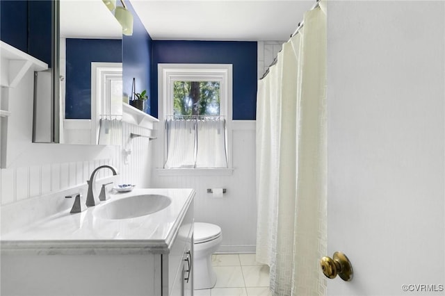 1708 Hollandale Rd, Henrico, VA 23238 - full bathroom with vanity, a wainscoted wall, and marble finish flooring