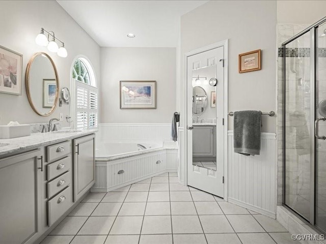 4416 Killiam Ct, Henrico, VA 23060 - bathroom featuring double vanity, a bath, a stall shower, and tile patterned flooring