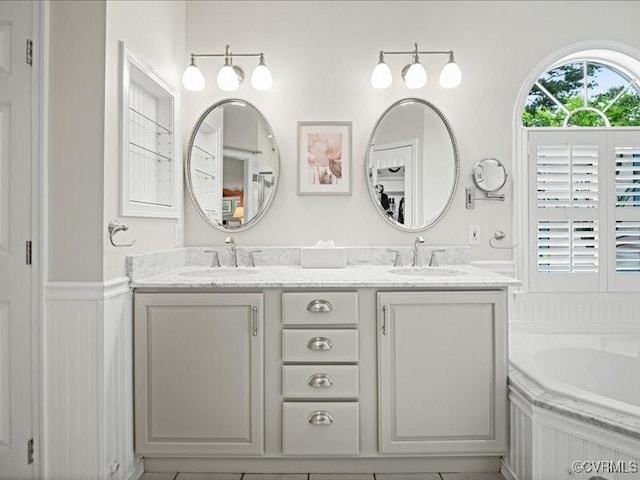 4416 Killiam Ct, Henrico, VA 23060 - full bath with double vanity, a bath, and wainscoting