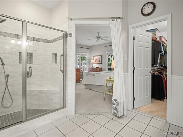 4416 Killiam Ct, Henrico, VA 23060 - ensuite bathroom with a ceiling fan, a stall shower, wainscoting, tile patterned floors, and a walk in closet