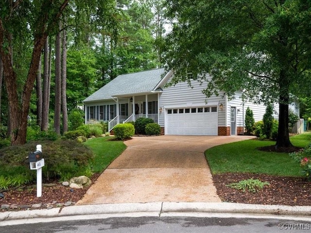 4416 Killiam Ct, Henrico, VA 23060 - ranch-style house with a porch, an attached garage, concrete driveway, and a front lawn