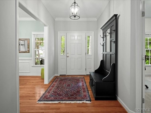 4416 Killiam Ct, Henrico, VA 23060 - foyer with wood finished floors, ornamental molding, and a chandelier