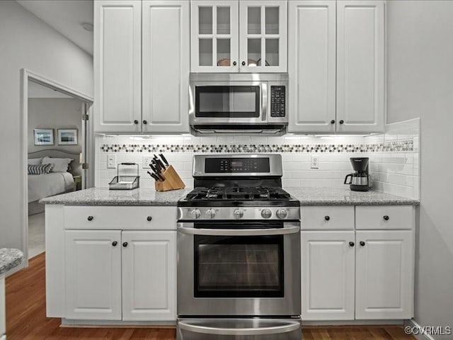 4416 Killiam Ct, Henrico, VA 23060 - kitchen featuring stainless steel appliances, white cabinets, and dark wood-style flooring