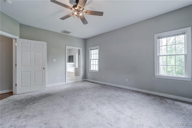 5501 Pine Needles Ter, Providence Forge, VA 23140 - unfurnished bedroom with carpet floors, ensuite bath, and a ceiling fan