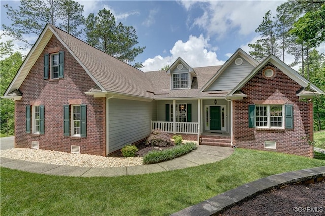 5501 Pine Needles Ter, Providence Forge, VA 23140 - view of front facade featuring crawl space, brick siding, covered porch, and a front lawn