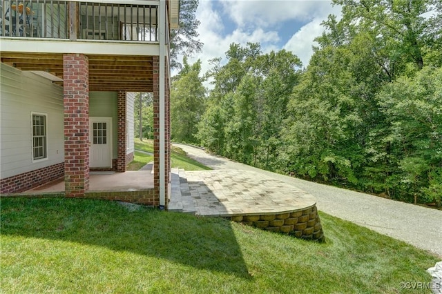5501 Pine Needles Ter, Providence Forge, VA 23140 - view of grassy yard featuring a patio area