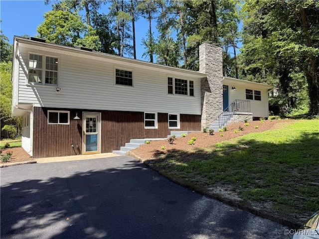 7335 Cherokee Rd, Richmond, VA 23225 - view of front of home with a chimney