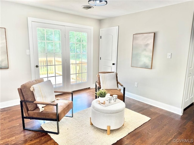 7335 Cherokee Rd, Richmond, VA 23225 - living area with baseboards and wood finished floors