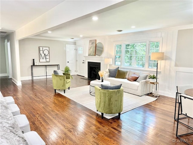 7335 Cherokee Rd, Richmond, VA 23225 - living area with a fireplace, ornamental molding, wood finished floors, and recessed lighting
