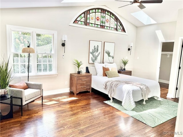 7335 Cherokee Rd, Richmond, VA 23225 - bedroom with a skylight, lofted ceiling, wood finished floors, and a ceiling fan