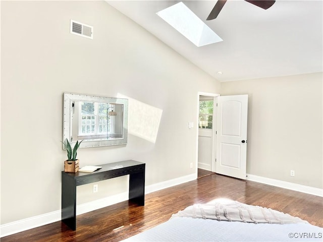 7335 Cherokee Rd, Richmond, VA 23225 - bedroom with a skylight, wood finished floors, high vaulted ceiling, and ceiling fan