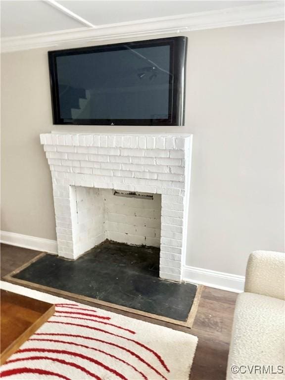 7335 Cherokee Rd, Richmond, VA 23225 - detailed view of ornamental molding, wood finished floors, and a fireplace