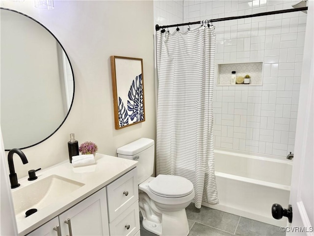7335 Cherokee Rd, Richmond, VA 23225 - bathroom featuring tile patterned flooring, vanity, and shower / tub combo