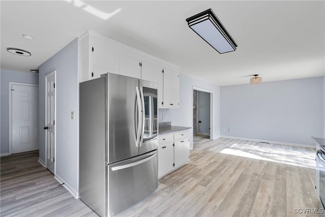 72 Whispering Pine Ln, Bumpass, VA 23024 - kitchen featuring smart refrigerator, light wood-style flooring, white cabinets, and light countertops