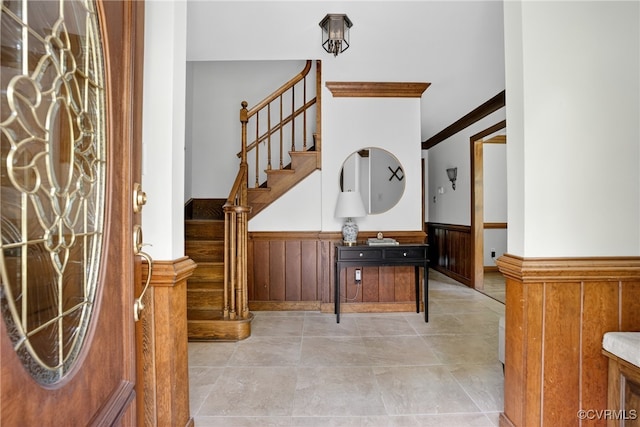8327 Fulham Ct, Richmond, VA 23227 - entrance foyer with a wainscoted wall, stairway, and wood walls