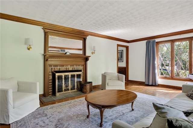 8327 Fulham Ct, Richmond, VA 23227 - living room featuring a brick fireplace, crown molding, and wood finished floors