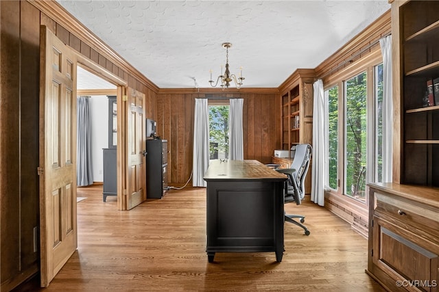 8327 Fulham Ct, Richmond, VA 23227 - home office featuring a chandelier, crown molding, light wood finished floors, and wood walls