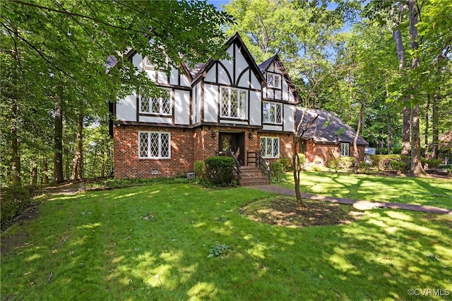8327 Fulham Ct, Richmond, VA 23227 - view of front of home featuring brick siding, a front lawn, and stucco siding