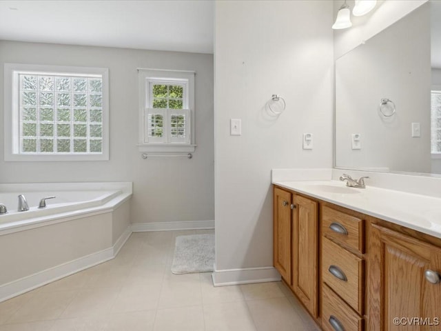 1960 Teal Ln, Powhatan, VA 23139 - bathroom with vanity, a garden tub, and tile patterned floors