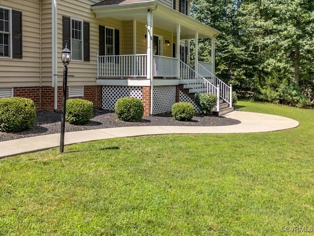 1960 Teal Ln, Powhatan, VA 23139 - view of front facade with a front lawn, a porch, crawl space, and stairs