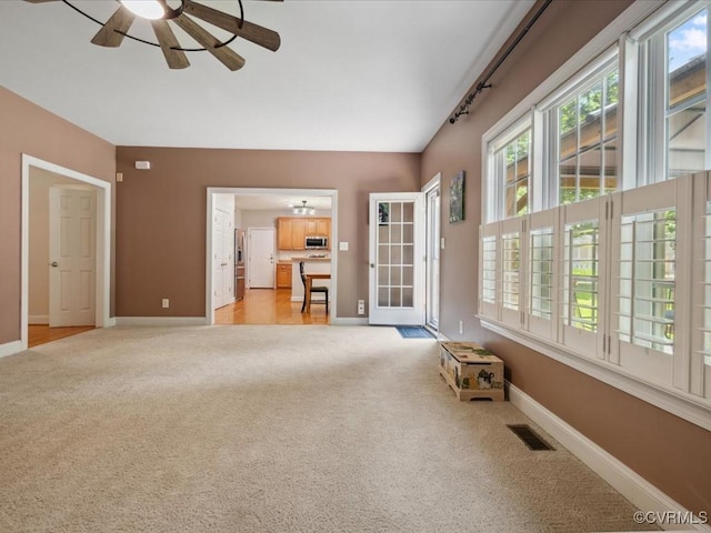 1960 Teal Ln, Powhatan, VA 23139 - unfurnished living room with light colored carpet and ceiling fan