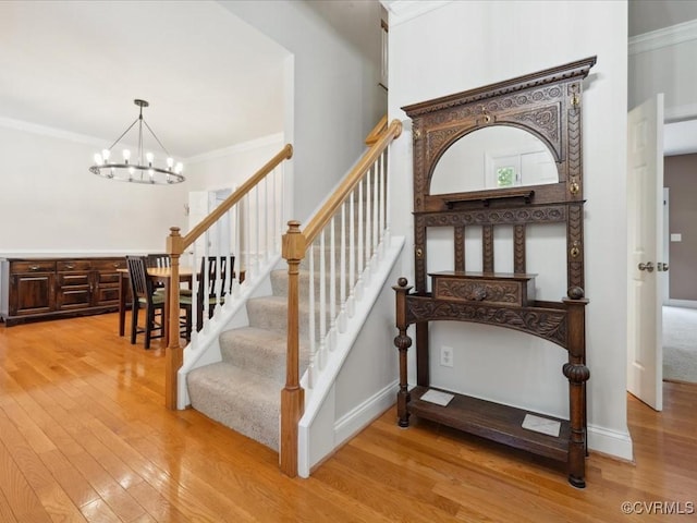 1960 Teal Ln, Powhatan, VA 23139 - stairway featuring a chandelier, wood finished floors, and ornamental molding