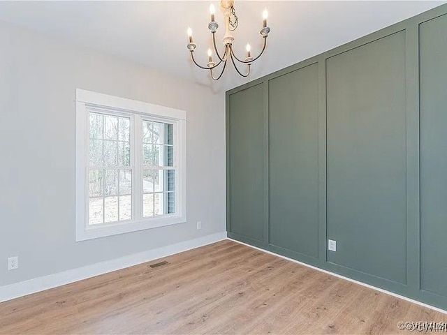 4788 Powhatan Lakes Rd, Powhatan, VA 23139 - unfurnished dining area with a chandelier and light wood finished floors