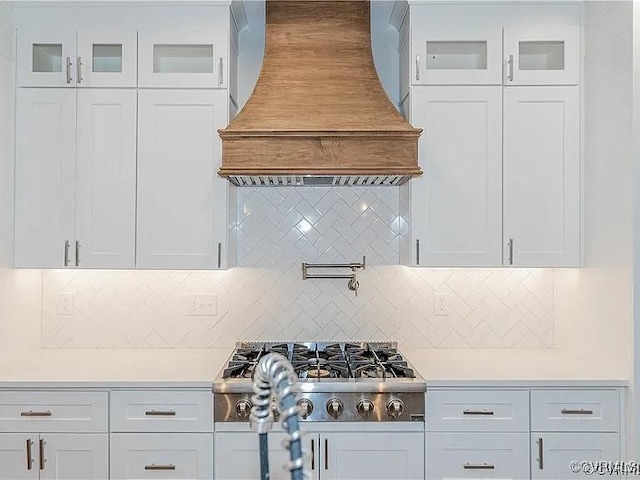 4788 Powhatan Lakes Rd, Powhatan, VA 23139 - kitchen with premium range hood, light countertops, and white cabinetry