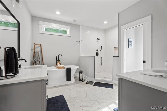 4788 Powhatan Lakes Rd, Powhatan, VA 23139 - bathroom featuring vanity, a stall shower, a soaking tub, tile patterned floors, and recessed lighting