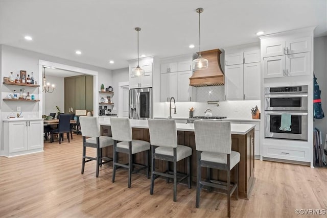 4788 Powhatan Lakes Rd, Powhatan, VA 23139 - kitchen with appliances with stainless steel finishes, open shelves, custom range hood, light countertops, and recessed lighting