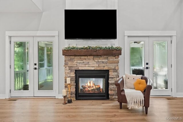 4788 Powhatan Lakes Rd, Powhatan, VA 23139 - sitting room with french doors, wood finished floors, and a fireplace