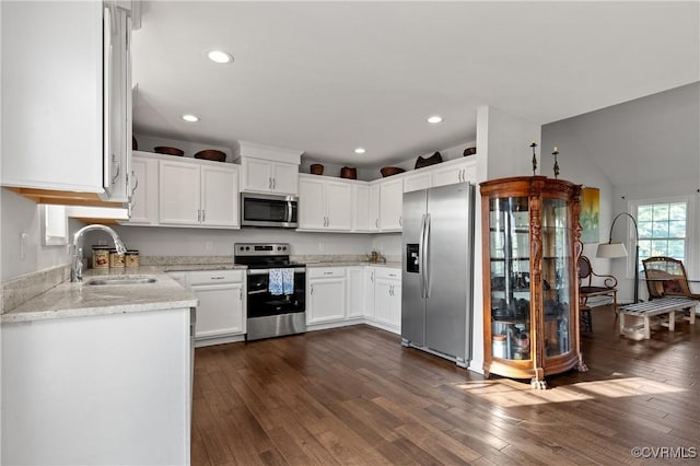 4473 Pin Oak Rd, Prospect, VA 23960 - kitchen featuring stainless steel appliances, dark wood finished floors, white cabinetry, light stone countertops, and recessed lighting