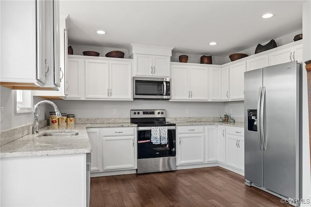 4473 Pin Oak Rd, Prospect, VA 23960 - kitchen with appliances with stainless steel finishes, dark wood-type flooring, white cabinetry, and recessed lighting