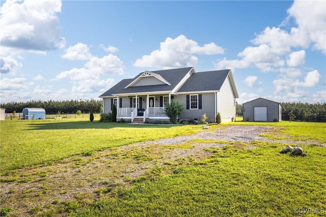 4473 Pin Oak Rd, Prospect, VA 23960 - ranch-style home featuring a porch, a storage unit, a detached garage, and a front yard